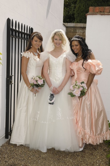 Horny bride gets involved in an IR lesbian threesome with her bridesmaids
