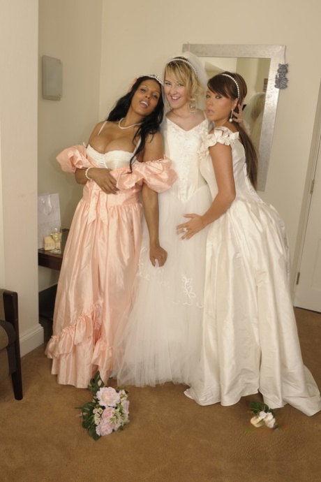 Horny bride gets involved in an IR lesbian threesome with her bridesmaids