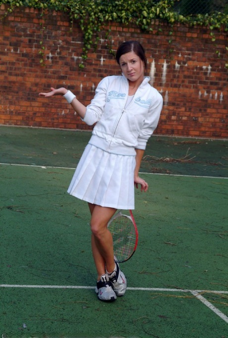 Hot British tennis player Olivia strips & masturbates on the court