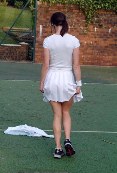 Hot British tennis player Olivia strips & masturbates on the court