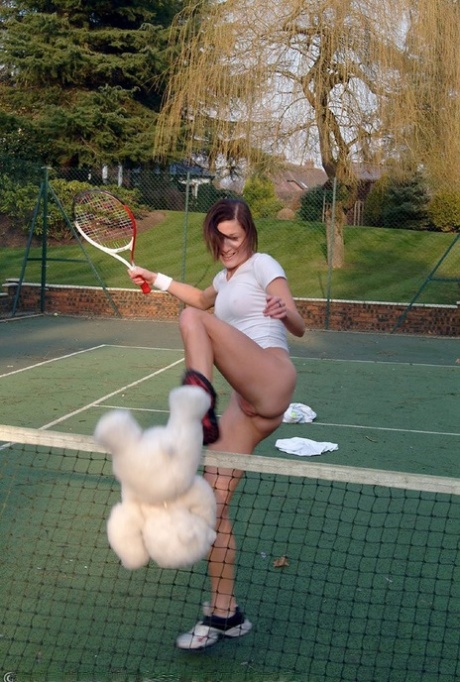 Hot British tennis player Olivia strips & masturbates on the court