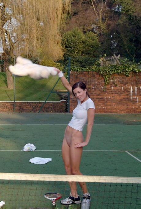 Hot British tennis player Olivia strips & masturbates on the court