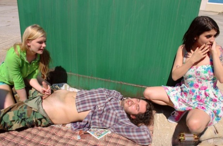 Naughty teens Raquel Roper and Jessie Young undress a dude and jack him off